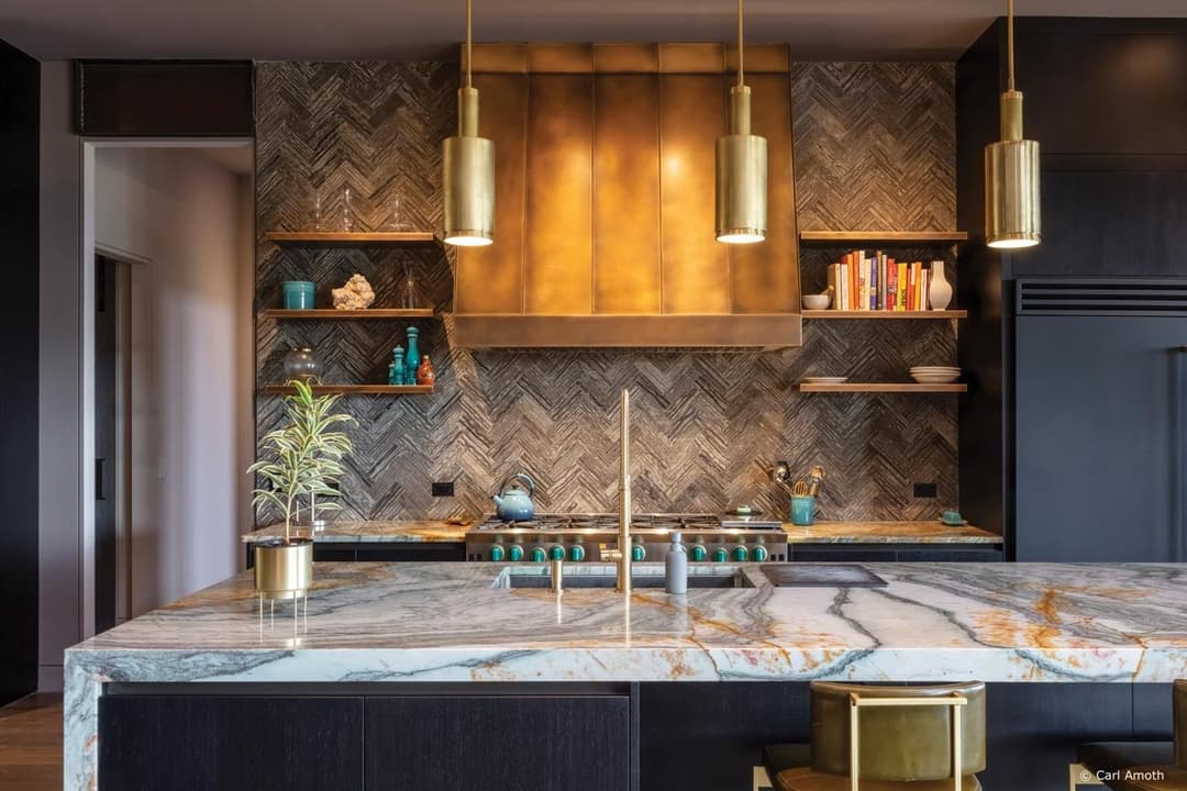 gourmet-quality indoor kitchen is paired with a catering-quality outdoor grill zone