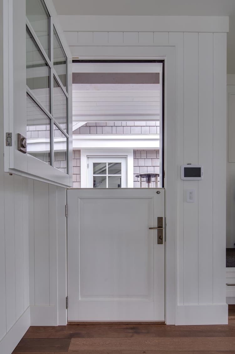 Dutch door with raised panel on bottom, glass lite on top