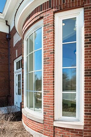 Ultra Series custom curved stationary windows to match Majesta double hungs