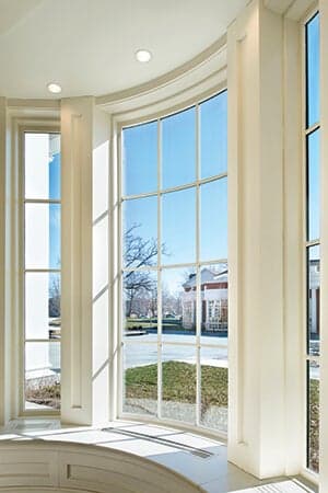 Ultra Series custom curved stationary windows to match Majesta double hungs